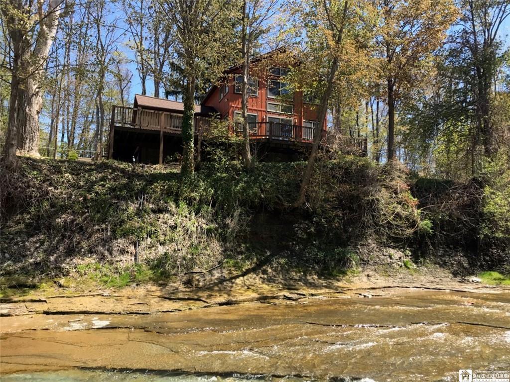 Back side of home that overlooks creek - 71 Porter Ave