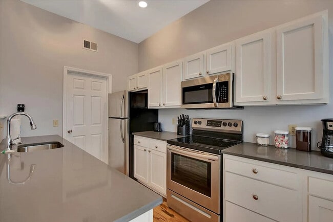 Kitchen, picture taken before tile backsplash was installed. - 4206 Castleman Ave