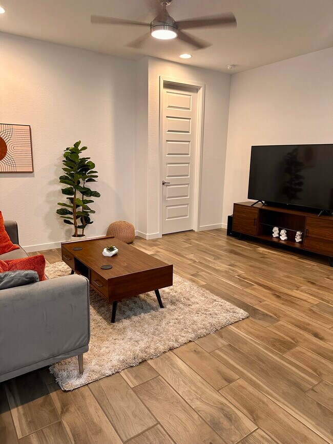 Living room with smart tv - 20896 S 231st Pl