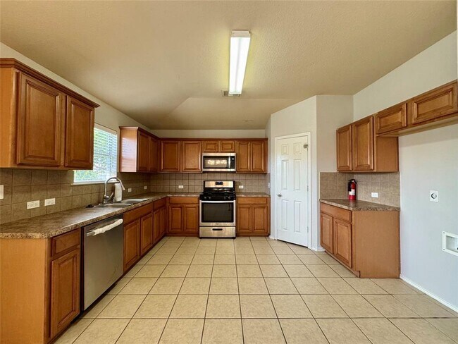 Foto del edificio - 14828 Falling Stone Ln
