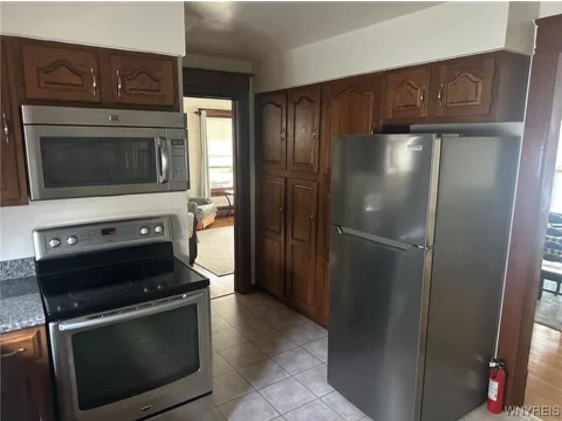 Shared living room and dining room view from the kitchen - 115 N 17th St