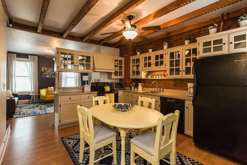 Walk up the stairs into the kitchen (will be refacing the cabinets) - 440 E Orange St