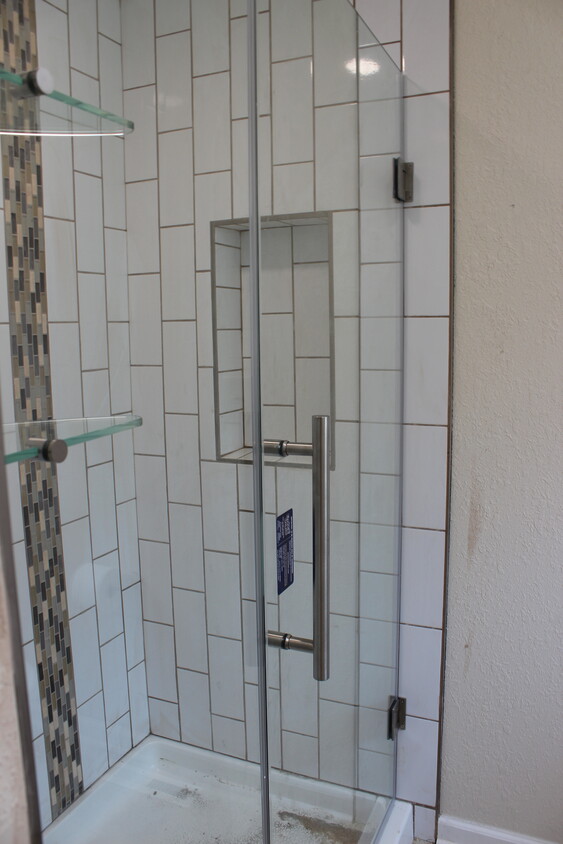 Tile bathrooms with glass shower doors - 12625 W Courtland Ave