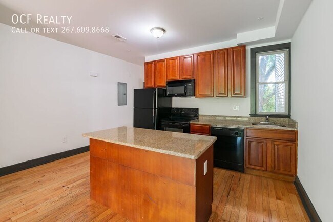 Foto del edificio - 4 Bed Cecil B Moore Apartment