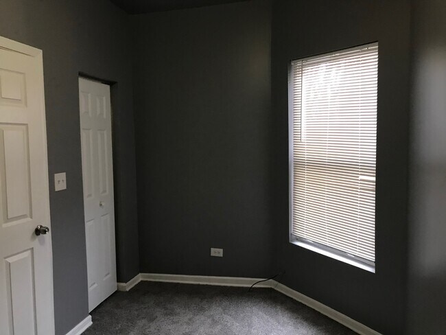 Building Photo - 6438 S Vernon Ave