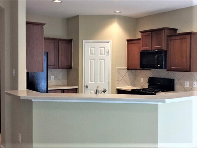 Foto del edificio - 15742 Flagstone Walk Way