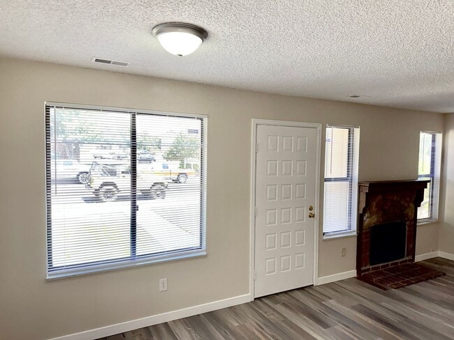Building Photo - Updated Two Bed Townhome Nestled in the He...