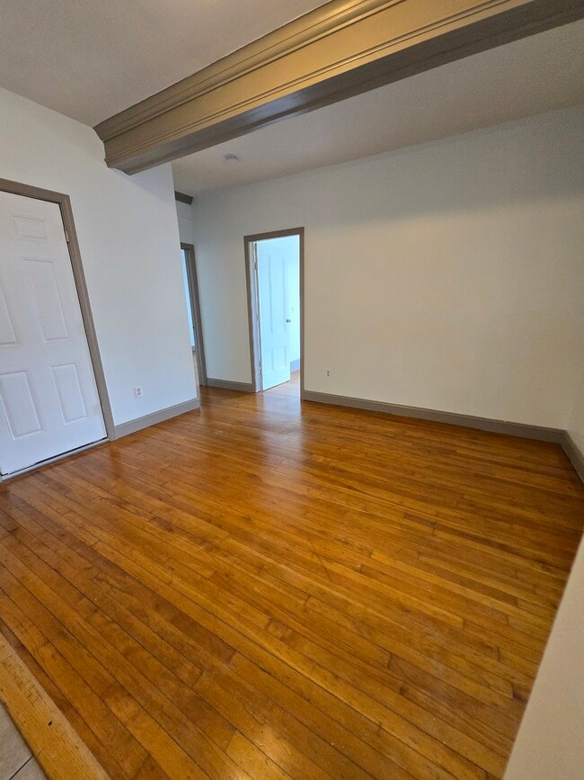Living room, view from dining room - 127 Pearl St