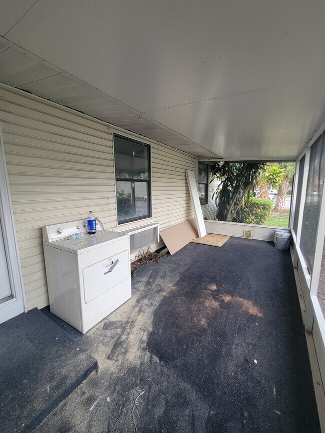 Screened patio (in progress) - 4079 E Michigan St