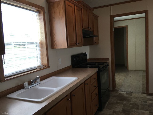Building Photo - 3 br, 2 bath House - Heartland Village