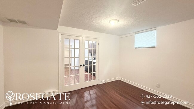 Building Photo - Brand New 1-Bedroom + Den Basement Unit in...