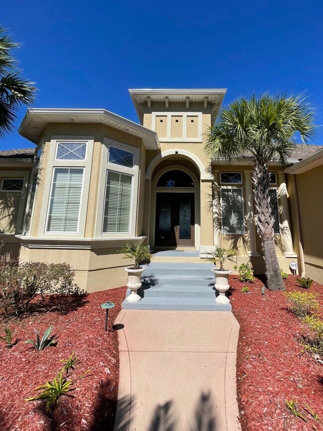 Building Photo - Luxury 3BR/3.5BA + Office in Winding River with breathtaking marsh views