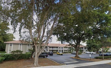 Building Photo - 11213 Royal Palm Blvd