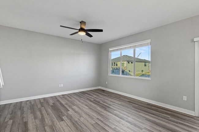 Building Photo - Spacious 4-Bedroom Home with 2-Car Garage & Yard