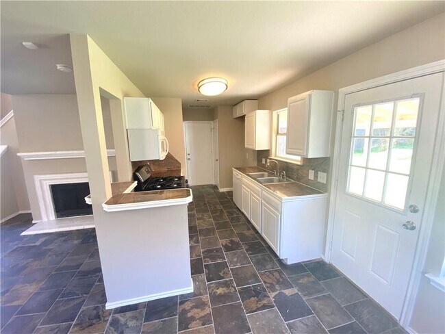 Foto del edificio - 6417 Orange Blossom Way