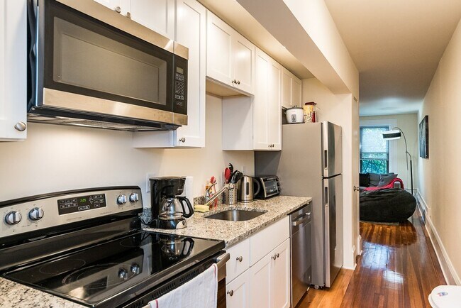 Building Photo - Updated Kitchen - Central Heat/AC - High C...