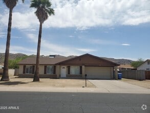 Building Photo - 1511 E Desert Dr