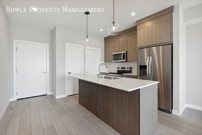Building Photo - AMAZING 2 BED/ 1 BATH CONDO WITH PETS ALLOWED!