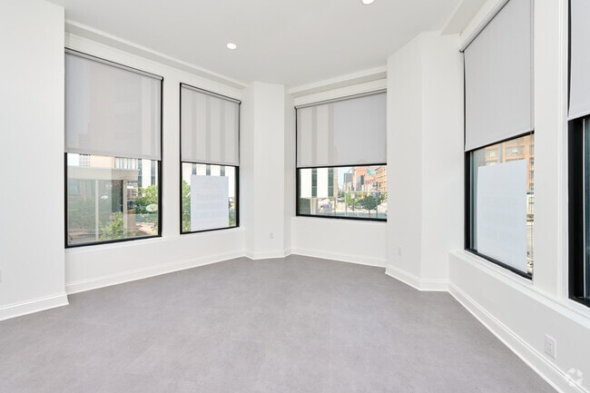 2BR, 1BA - 935SF - Living Room/Dining Room - The Triangle - Student Housing
