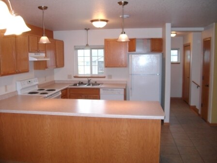 Building Photo - Rose Marie Condos