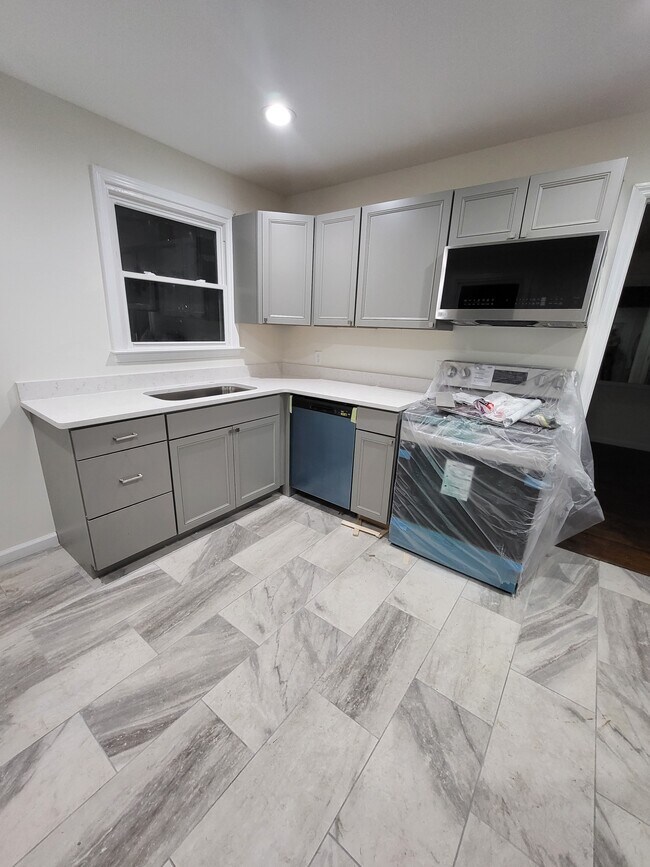 Kitchen (while still under construction) - 1512A Sweetbriar Ave