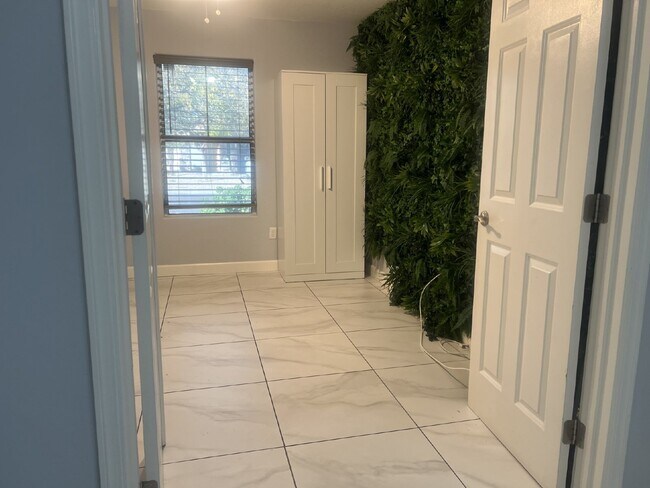 Building Photo - "Charming 4-Bed Oasis with Granite Touch & a Beautiful Pool"