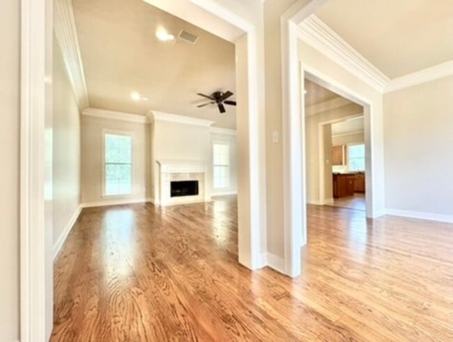 Building Photo - Spacious 4-Bedroom with Fireplace & Fenced...
