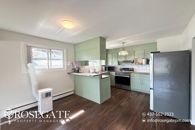 Building Photo - Bright & Renovated 3-Bedroom Unit in Centr...