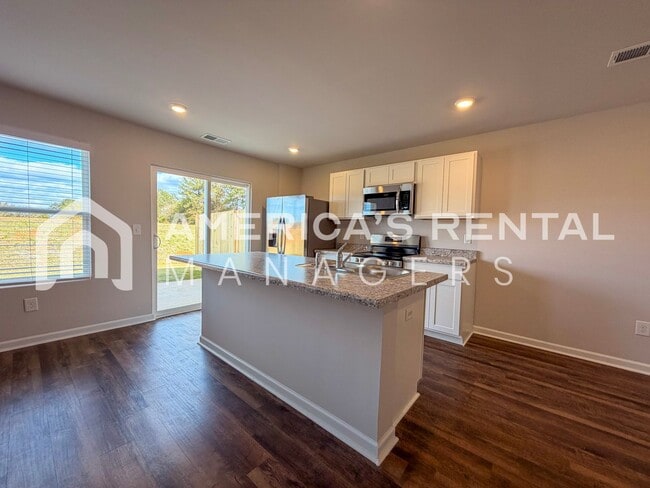 Building Photo - ONE MONTH FREE AND HALF OFF DEPOSIT! Stylish 3-Bedroom Townhome with Easy I-20 Access
