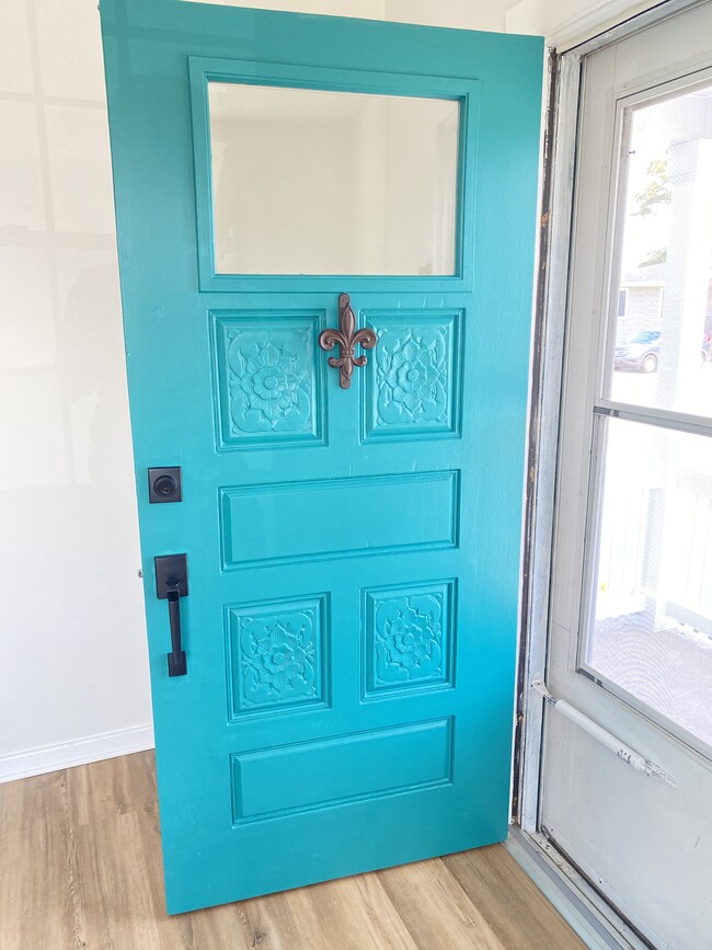 Original door, updated for natural light - 7900 Richard St