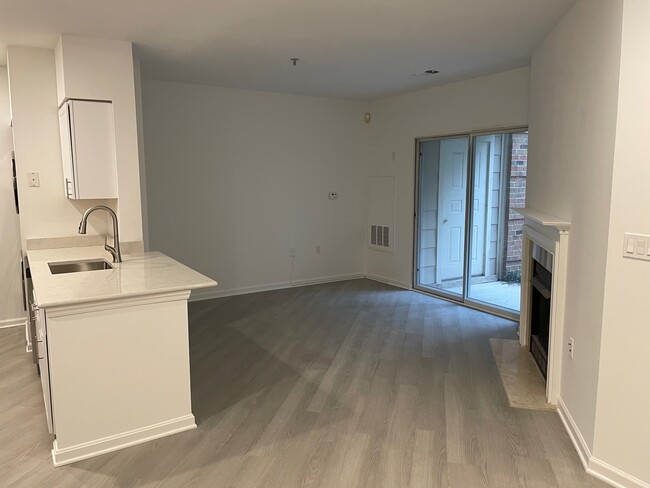 Kitchen, Family Room with Fireplace, and Patio - 12913 Alton Sq