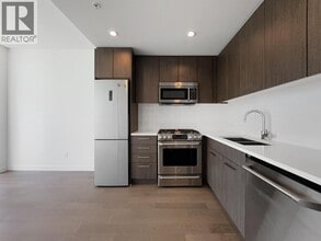 Building Photo - 9060-9060 University Crescent