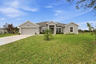 Building Photo - 5923 NW Brianna Ct