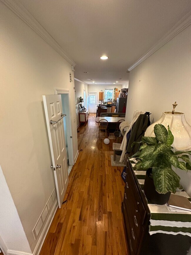 Building Photo - Spacious, Renovated 4BR/2.5BTH w/ HW Floor...
