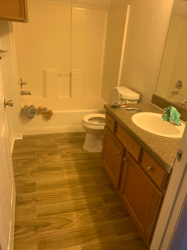Washroom new toilet and new floors - 5447 Vineland Rd