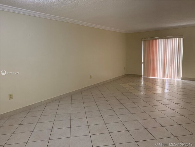 Building Photo - 9911 W Okeechobee Rd