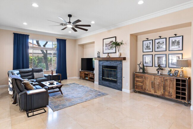 Building Photo - Spacious Mountain’s Edge Home with Den, Sunroom, 3-Car Garage & Private Spa Retreat