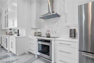 Building Photo - 8967 Lely Island Cir
