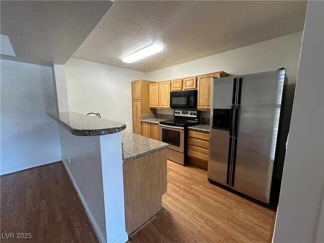 Building Photo - 5055 W Hacienda Ave