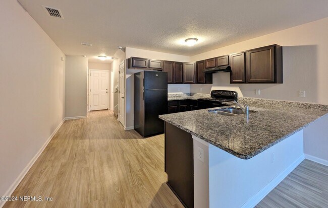 Building Photo - 8511 McGirts Village Ln