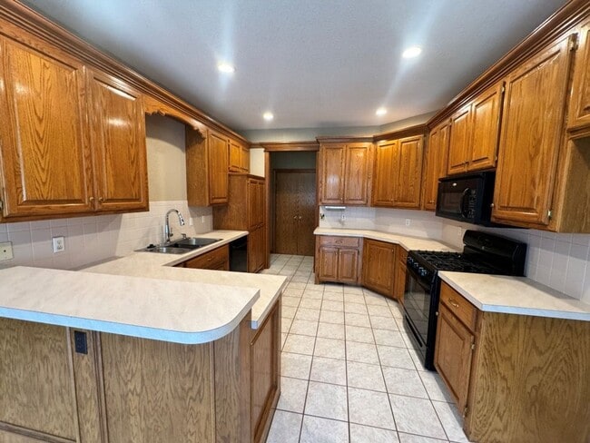 Photo - 4-bedroom 2 bath home in Kingsbrook, lots of storage, 2 dining areas and stand-up storm shelter! ...