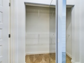 Closet Side 1 - Aurora St. Leon Apartments