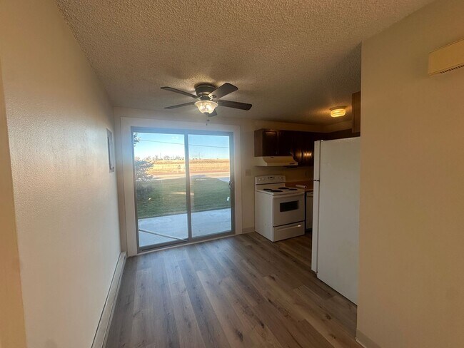 Building Photo - Two Bedroom, One and half bath townhome cl...