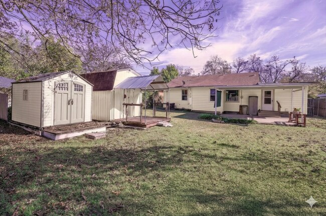 Building Photo - **WELL-MAINTAINED HOME WITH FENCED BACKYARD WITH TWO STORAGE BUILDINGS AVAILABLE FOR RENT FOR THE...