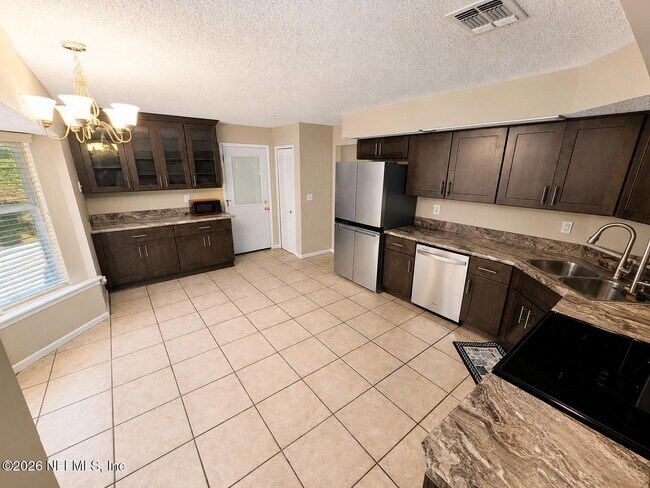 Foto del edificio - 7855 Collins Ridge Blvd
