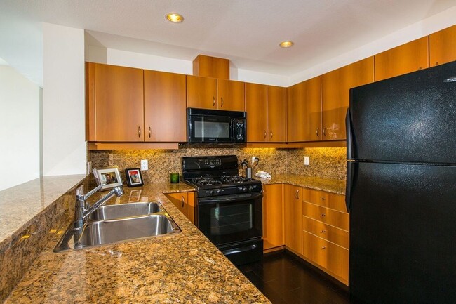 Building Photo - Fully Furnished, 2 bedrooms, 2 bath in the...