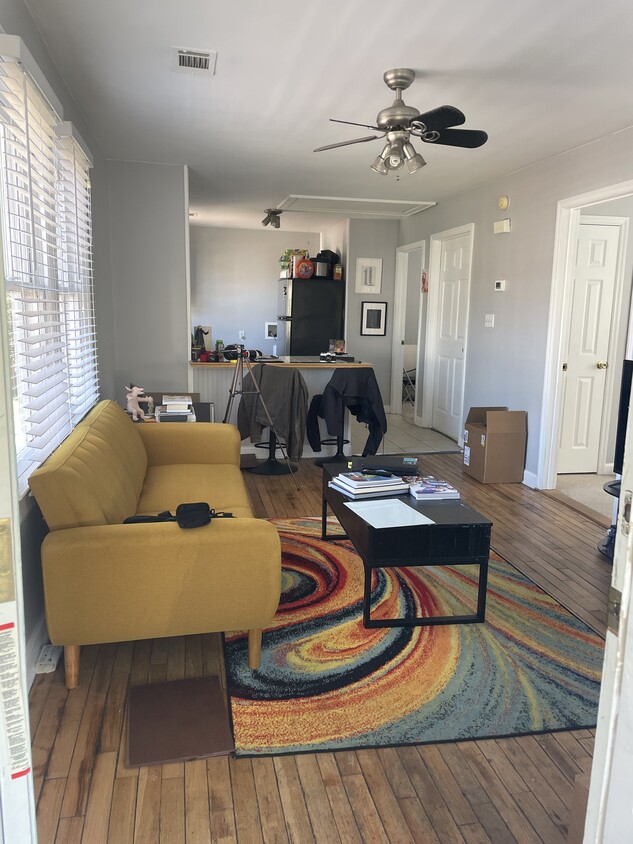 Sunny open living room - 314 E 55th St