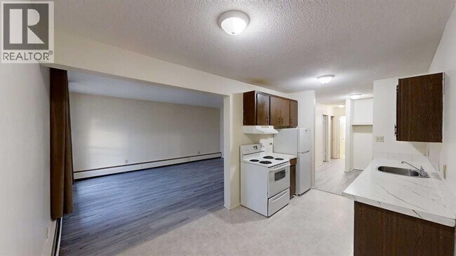 Building Photo - 10222-10105 105 Ave