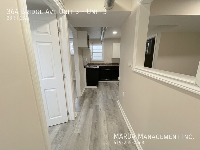 Building Photo - UPDATED 2-BEDROOM/1-BATH MAIN FLOOR UNIT-I...