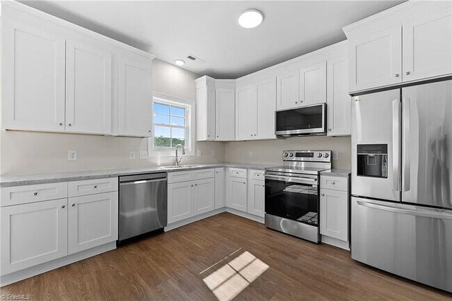 Building Photo - Earn Wealth While Leasing - Like a Homeown...